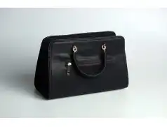 Torebka listonoszka damska – jaka sprawdzi się na wakacje?